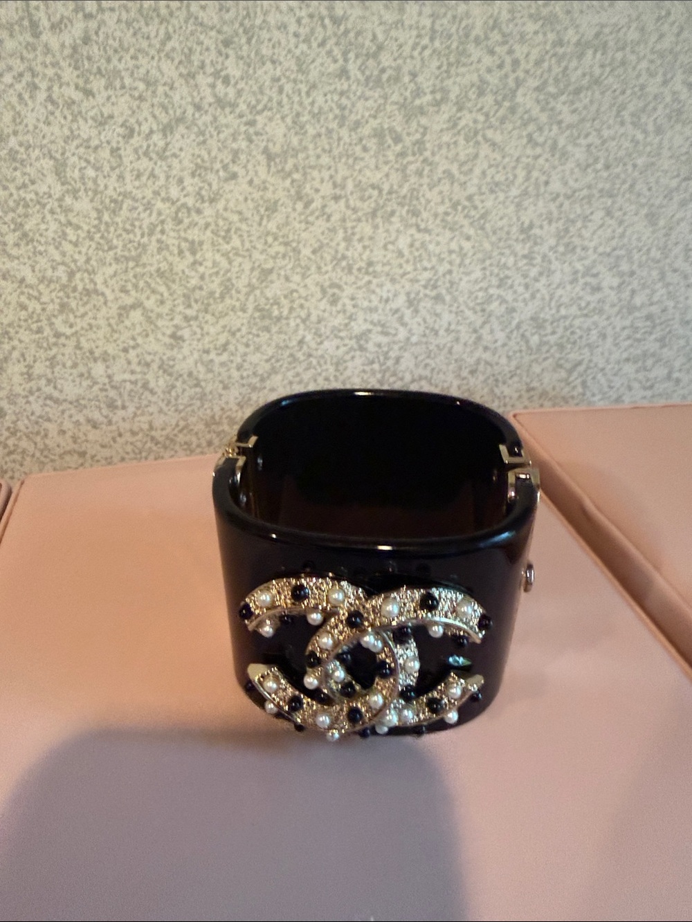Black Jeweled Bangle Bracelet with Interlocking Logo Accent